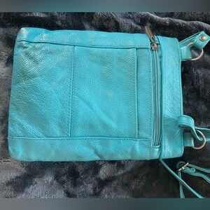 Vibrant Leather Turquoise Crossbody Bag with Many Pockets